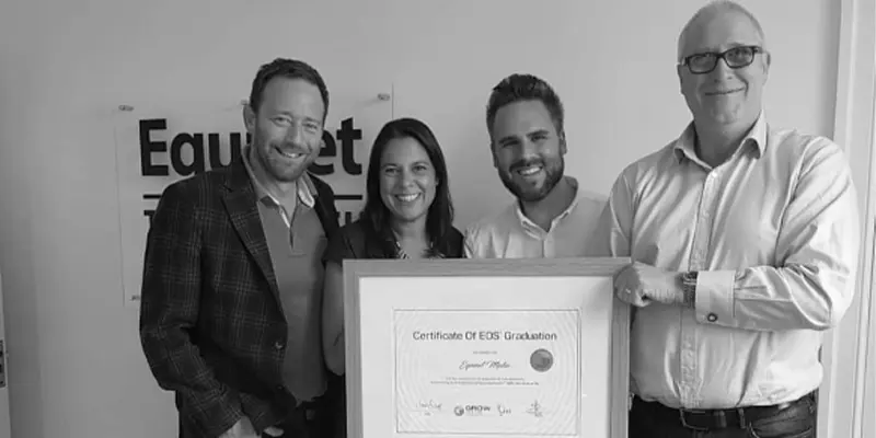 equinet team holding their eos certificate